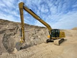2022 Caterpillar 320 crawler excavator, side view