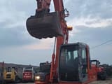 2006 Hitachi ZX130 crawler excavator, front view