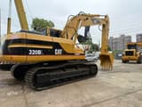 2010 Caterpillar 320BL crawler excavator, rear three-quarter view