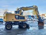 2018 Caterpillar M318F wheel excavator, side profile view