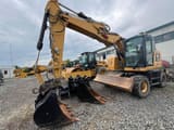 2018 Caterpillar M315F wheel excavator, front three-quarter view