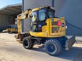 2023 Komatsu PW98MR-11E0 wheel excavator, rear three-quarter view
