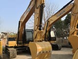 2024 Caterpillar 320GC crawler excavator, front three-quarter view