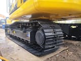 Komatsu PC130 crawler excavator undercarriage view