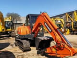 2018 Doosan DH60 crawler excavator, front three-quarter view