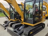 2024 Caterpillar 306E2 mini excavator, front three-quarter view