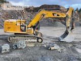 2019 Caterpillar 374FL crawler excavator side view
