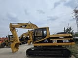 2005 Caterpillar 320BL crawler excavator side view