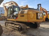Caterpillar 325D crawler excavator, rear three-quarter view
