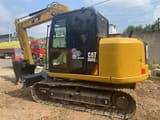 2024 Caterpillar 308E2 mini excavator, side view