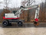 2014 Takeuchi TB 1160 W wheel excavator side view