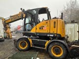 Hydrema MX16 RAIL wheel excavator, side profile view