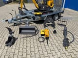 Berger Kraus BK1000JSR mini excavator on trailer with attachments