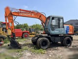 1993 Hitachi EX100WD wheel excavator side view