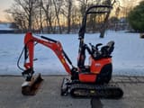 2017 Kubota U10-3 mini excavator side view