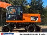 2011 Caterpillar M318D wheel excavator, side profile view