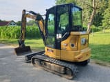 2022 Caterpillar 304 Mini Excavator, rear three-quarter view