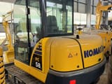 2023 Komatsu PC58 mini excavator, rear three-quarter view