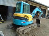 2009 Kubota U50-3 mini excavator, rear three-quarter view