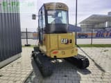 2023 Caterpillar 303.5CR-07A mini excavator, rear view