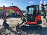 2023 Kubota KX042-4A mini excavator, side view