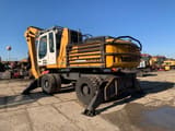 2012 Liebherr A924C LITRONIC material handler, rear three-quarter view