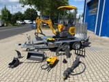 Berger Kraus BK1250JSR mini excavator on trailer with attachments