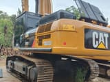 2025 Caterpillar 336D crawler excavator, rear three-quarter view