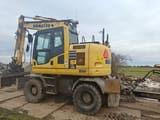 2017 Komatsu PW148-10 wheel excavator, side view