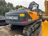 2022 Hyundai 220LC-9 crawler excavator, rear three-quarter view