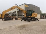 2020 Caterpillar MH3022-1 wheel excavator side view