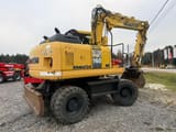 2009 Komatsu PW160 wheel excavator, rear three-quarter view