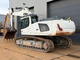 2015 Liebherr R946 crawler excavator, rear three-quarter view