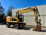 2016 Caterpillar M318F wheel excavator side view