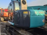 2024 Kobelco SK135SR crawler excavator, rear three-quarter view