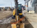 2018 Caterpillar 305.5E mini excavator, front view