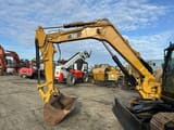 2015 Caterpillar 308E2CR mini excavator side view