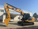 Гусеничний екскаватор 2023 Caterpillar 320D2, боковий профіль