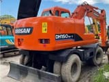 2022 Doosan DH150W-7 wheel excavator, rear three-quarter view