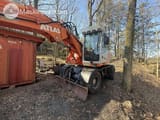 2003 Atlas 1404 wheel excavator, front three-quarter view