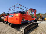 2023 Doosan DX300LC-9C crawler excavator, rear three-quarter view
