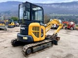 2016 Komatsu PC35MR-3 mini excavator, rear three-quarter view