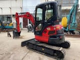 2022 Kubota U35 mini excavator, rear three-quarter view