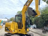 2018 Caterpillar 306D mini excavator, rear three-quarter view
