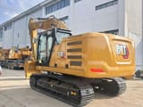 2023 Caterpillar 320GC crawler excavator, rear three-quarter view