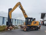 2018 Caterpillar MH3024 material handler, side view