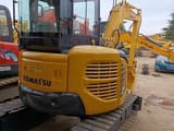 Komatsu PC50MR mini excavator, rear three-quarter view