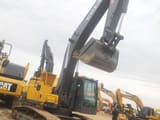 Volvo EC300 crawler excavator, low-angle side view