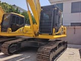 2025 Komatsu PC240LC-7 crawler excavator, front three-quarter view