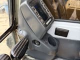 2024 Caterpillar 320BL crawler excavator interior cabin control panel